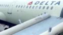 Passenger deploys emergency exit slide on Delta flight