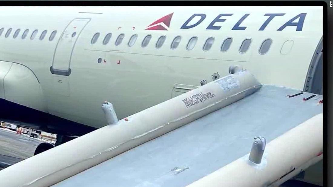 Passenger deploys emergency exit slide on Delta flight CNN Video