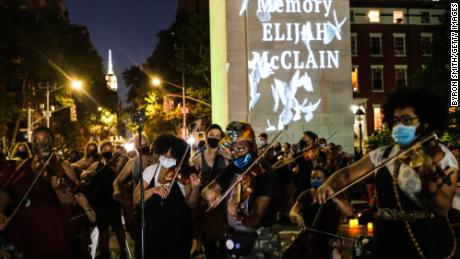 String players perform during a violin vigil for Elijah McClain in Washington Square Park on June 29, 2020 in New York City. 