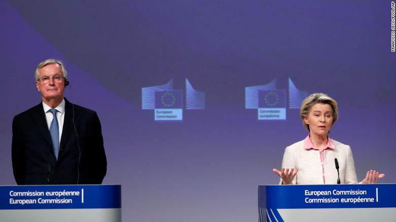 European Commission President Ursula von der Leyen, right, and European Commission&#39;s Head of Task Force for Relations with the UK Michel Barnier speak after the deal was agreed in Brussels on Thursday.