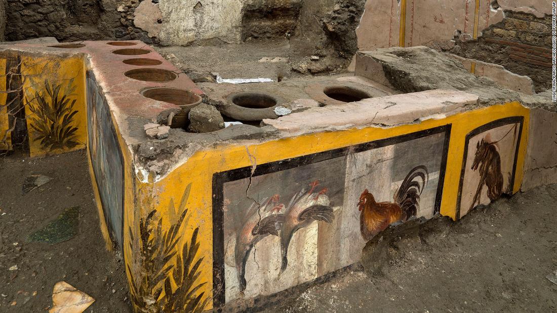 Ancient snack stall uncovered in Pompeii, revealing bright frescoes and traces of 2,000-year-old street food