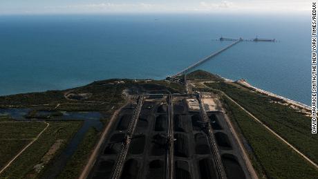 Coal awaiting export at the Abbot Point coal terminal, in Queensland, Australia, July 5, 2017. Australia has approved the Adani Group&#39;s Carmichael coal mine project, which would export through this port. 