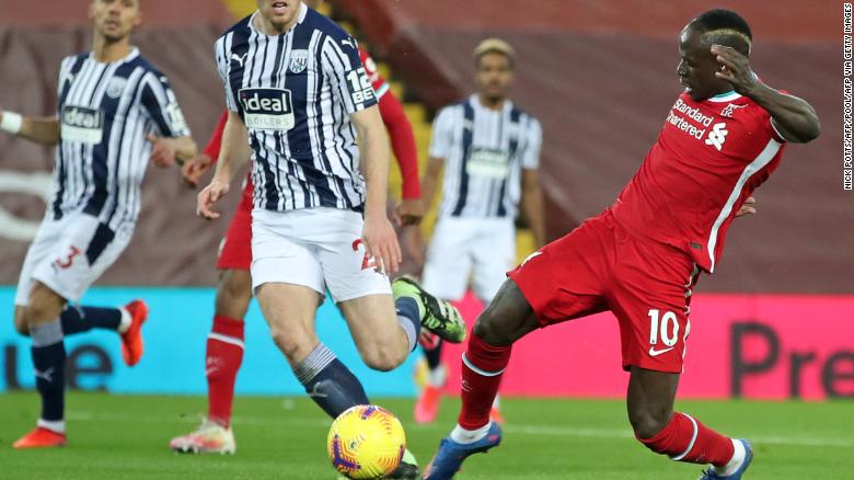 Liverpool's Sadio Mane scores the opening goal against West Bromwich Albion after neatly controlling Joel Matip's sharp pass on Sunday, December 27. 