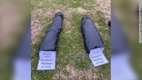 The body bags on the Marshall County Courthouse lawn.