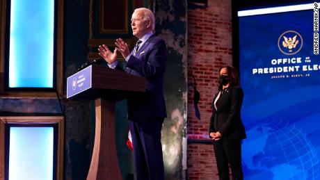 President-elect Joe Biden speaks at The Queen Theater on Monday, Dec. 28, 2020, in Wilmington, Del. Vice President-elect Kamala Harris listens at right. 