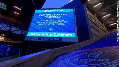 A big screen graphic announcing the fixture being called off before the expected Premier League match between Everton and Manchester City at Goodison Park on December 28 2020 in Liverpool, England.