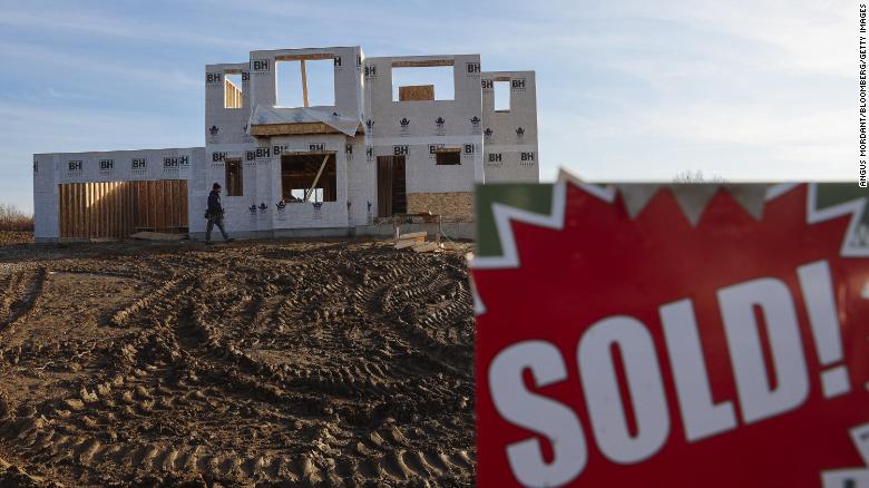 A "sold" sign outside a home under construction in Ballston Lake, New York 