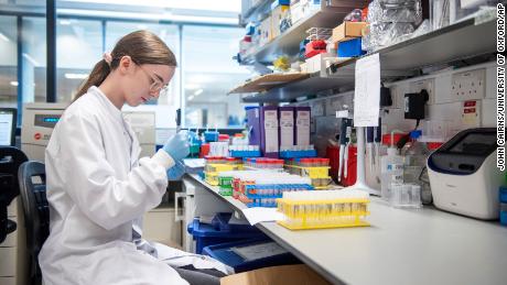 FILE - In this undated file photo issued by the University of Oxford, a researcher in a laboratory at the Jenner Institute in Oxford, England, works on the coronavirus vaccine developed by AstraZeneca and Oxford University. Britain on Wednesday, Dec. 30, authorized use of a second COVID-19 vaccine, becoming the first country to greenlight an easy-to-handle shot that its developers hope will become the &quot;vaccine for the world.&quot; The Department of Health said it had accepted a recommendation from the Medicines and Healthcare Products Regulatory Agency to authorize the vaccine developed by Oxford University and U.K.-based drugmaker AstraZeneca.  (John Cairns/University of Oxford via AP, File)