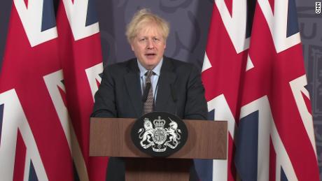 Boris Johnson surrounded by Union flags 