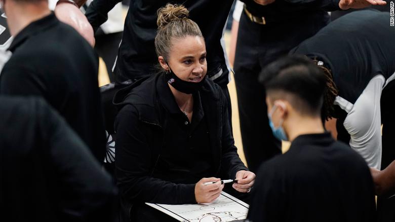 Becky Hammon calls a play during a timeout in the second half during the Spurs' game against the Lakers.