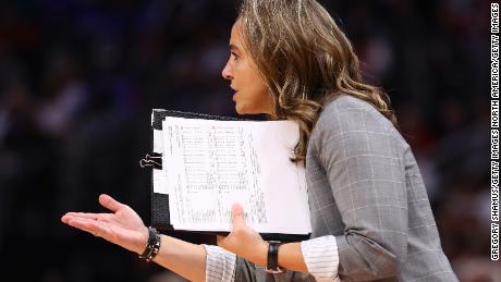 Becky Hammon has been an assistant coach with the NBA&#39;s San Antonio Spurs since 2014. She was hired by the WNBA&#39;s Las Vegas Aces to replace Bill Laimbeer as the team&#39;s head coach starting in the 2022 season.
