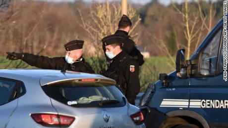 French gendarmes block access to the party about 40km south of Rennes on New Year&#39;s Day.