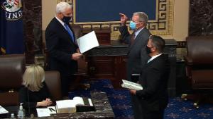 Vice President Mike Pence swears in senators on January 3 in Washington, DC.