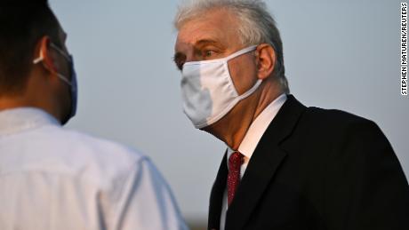 Kenosha County District Attorney Michael Graveley speaks with a man during a news conference in Kenosha, Wisconsin, on August 26, 2020.