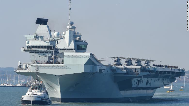 UK says its aircraft carrier strike group is ready to deploy. China’s already watching