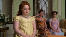 Nicola Coughlan as Penelope Featherington, Bessie Carter as Prudence Featherington and Harriet Cains as Philipa Featherington are shown in a scene from &quot;Bridgerton.&quot;