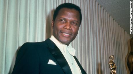 Bahamian American actor Sidney Poitier holding his Academy Award for Best Actor in a Leading Role for &#39;Lilies Of The Field&#39;, directed by Ralph Nelson, at the 36th Academy Awards ceremony, 13th April 1964. The ceremony was held at the Santa Monica Civic Auditorium, Santa Monica, California. (Photo by Archive Photos/Getty Images) 
