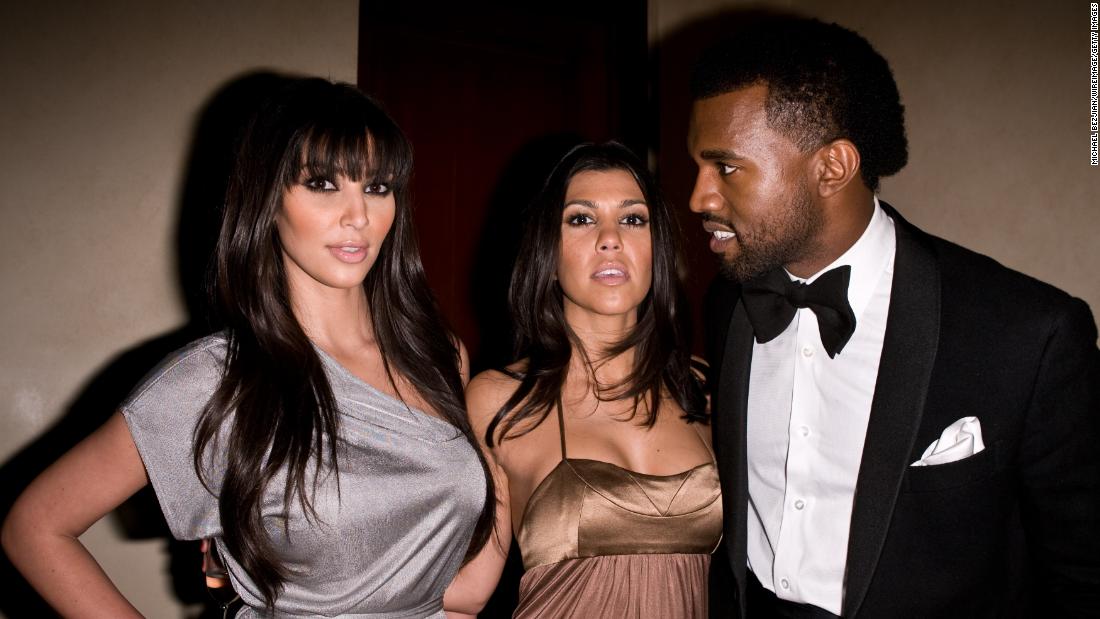 Kim and Kanye are joined by Kim&#39;s sister Kourtney at a party in Holmby Hills, California, in 2008.