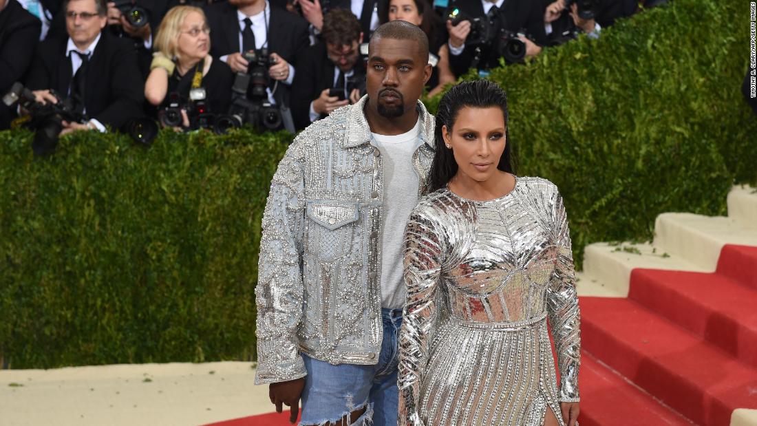 Kim and Kanye walk the red carpet at the Met Gala in May 2016.