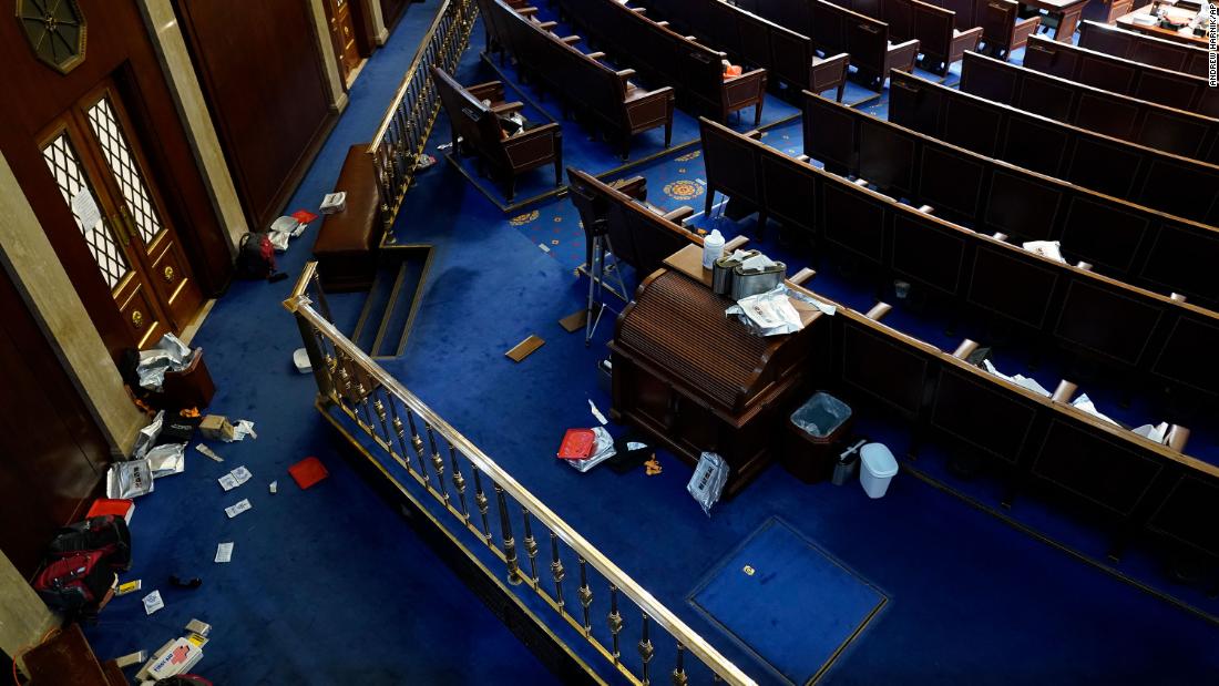 Papers and other materials litter the House chamber after it was evacuated.