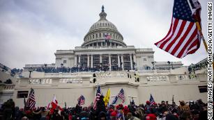 WASHINGTON, DC - JANUARY 06: Pro-Trump supporters storm the U.S. Capitol following a rally with President Donald Trump on January 6, 2021 in Washington, DC. Trump supporters gathered in the nation&#39;s capital today to protest the ratification of President-elect Joe Biden&#39;s Electoral College victory over President Trump in the 2020 election. (Photo by Samuel Corum/Getty Images)