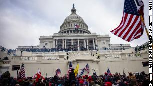 WASHINGTON, DC - JANUARY 06: Pro-Trump supporters storm the U.S. Capitol following a rally with President Donald Trump on January 6, 2021 in Washington, DC. Trump supporters gathered in the nation's capital today to protest the ratification of President-elect Joe Biden's Electoral College victory over President Trump in the 2020 election. (Photo by Samuel Corum/Getty Images)