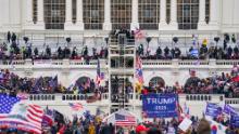 Trump supporters gather outside the Capitol, Wednesday, Jan. 6, 2021, in Washington. As Congress prepares to affirm President-elect Joe Biden&#39;s victory, thousands of people have gathered to show their support for President Donald Trump and his claims of election fraud. (AP Photo/John Minchillo)