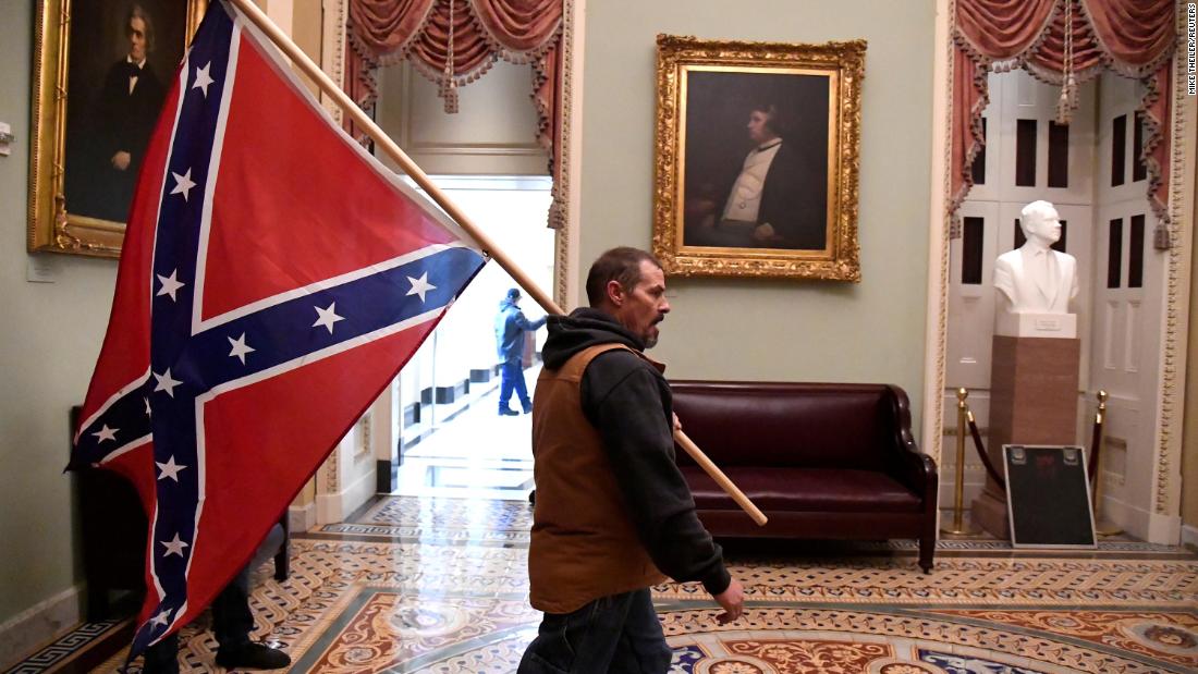 The Confederate flag, during the Civil War, never made it to the United States Capitol – but a rowdy carried one on Wednesday