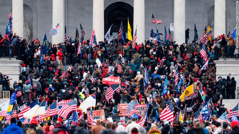 UNITED STATES - JANUARY 6: Trump supporters take over the steps of the Capitol on Wednesday, Jan. 6, 2021, as the Congress works to certify the electoral college votes. (Photo By Bill Clark/CQ-Roll Call, Inc via Getty Images)