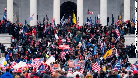 UNITED STATES - JANUARY 6: Trump supporters take over the steps of the Capitol on Wednesday, Jan. 6, 2021, as the Congress works to certify the electoral college votes. (Photo By Bill Clark/CQ-Roll Call, Inc via Getty Images)
