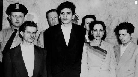 Puerto Rican nationalists (from left) Irving Flores Rodriguez, Rafael Cancel Miranda, Lolita Lebron and Andres Figueroa Cordero stand in a police lineup following their arrest after a shooting attack on Capitol Hill in 1954.