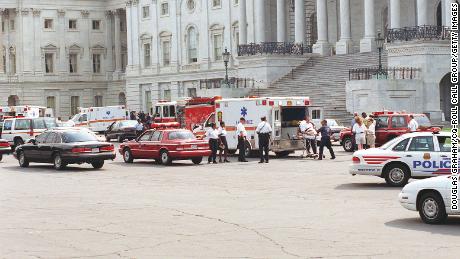 Tourists leave the Capitol on a stretcher after the violence and chaos caused by the shootings that claimed the lives of U.S. Capitol Police officers John Gibson and Jacob J. Chestnut. 