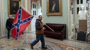 A Confederate flag at the Capitol summons America&#39;s demons