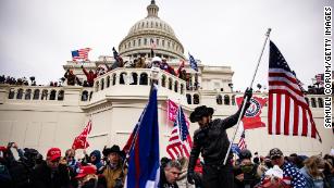 Decoding the extremist symbols and groups at the Capitol Hill insurrection 