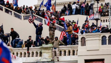 Pro-Trump supporters storm the US Capitol following a rally with President Donald Trump on January 6, 2021 in Washington, DC.