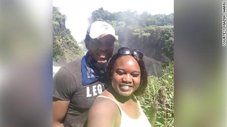 Roy George Tinashe Dikinya with his girlfriend Mazwi Shamu at Victoria Falls on New Year&#39;s Day. His body was retrieved by volunteers and others. 