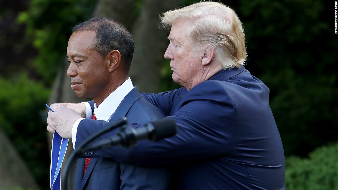 US President Donald Trump presents Woods with the Medal of Freedom after his Masters victory in 2019.
