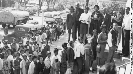 People wait to register to vote in Macon, Georgia, in 1962. Voting rights were denied many African Americans until 1965.