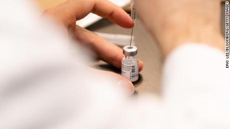 A pharmacist draws a dose of the Pfizer-BioNTech Covid-19 vaccine at the Brooklyn Center for Rehabilitation and Healthcare nursing home in the Brooklyn borough of New York, Tuesday, January 5.