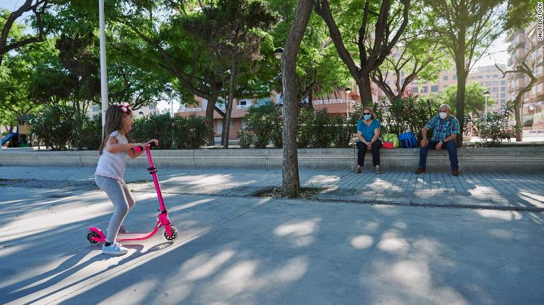 Vaccinated grandparents who want to visit with grandkids who havn&#39;t received the vaccine can safely meet outdoors, with everyone 6 feet apart, advised CNN Medical Analyst Dr. Leana Wen.