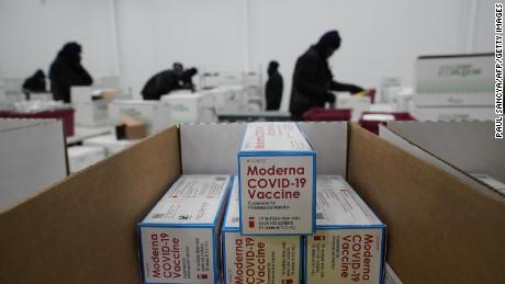 Boxes containing the Moderna vaccine are prepared to be shipped at the McKesson distribution center in Olive Branch, Mississippi on December 20.