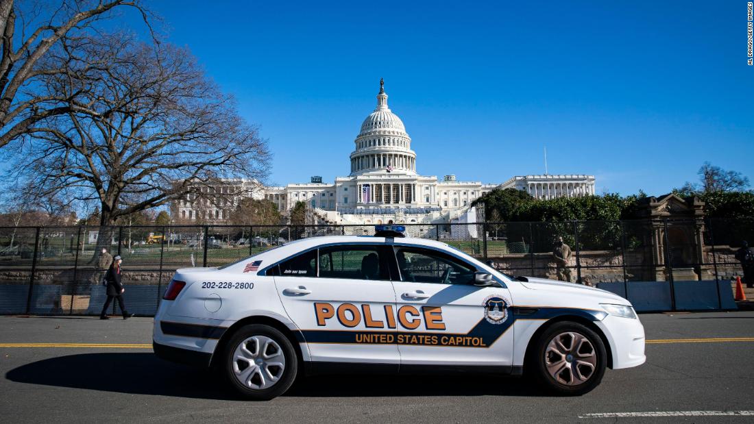 2 Capitol Police officers suspended and at least 10 more under