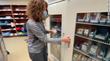 Doses of the vaccine are placed in a refrigerator in Thief River Falls, Minnesota.