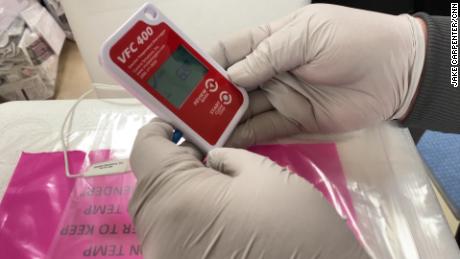 Data loggers are used to closely monitor the temperature of the fragile vaccine during transport.
