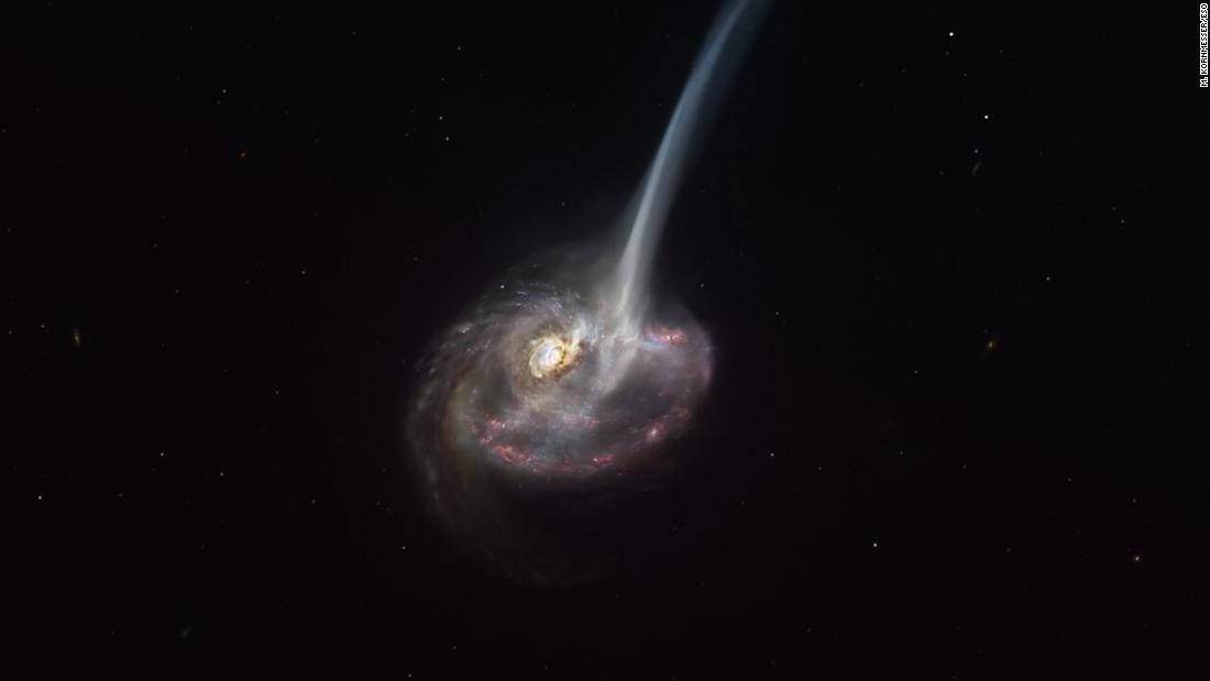 This artist&#39;s impression of the distant galaxy ID2299 shows some of its gas being ejected by a &quot;tidal tail&quot; as a result of a merger between two galaxies. 