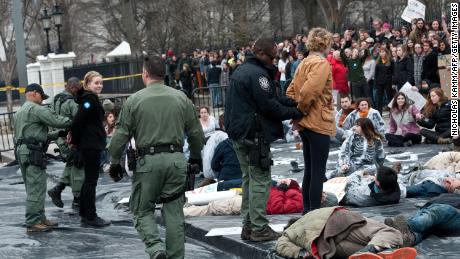 Students in front of the White House demonstrate against the proposed Keystone XL pipeline.