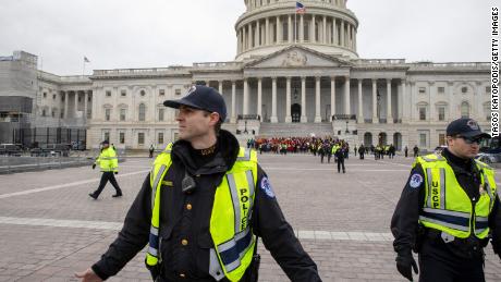 Police move back protesters at a climate change demonstration on Capitol Hill.