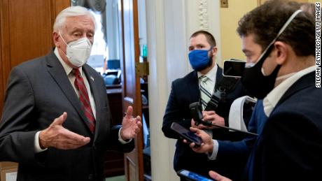 House Majority Leader Steny Hoyer (D-MD) (C) wears a protective mask while speaking to reporters at the U.S. Capitol on January 11, 2021 in Washington, DC. House Republicans blocked Hoyers efforts to quickly move a resolution that urged Vice President Mike Pence to use the 25th amendment to remove President Donald Trump from office, setting up a vote on the measure tomorrow. 