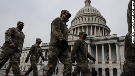 DC mayor urges people to avoid nation&#39;s capital as Secret Service begins inauguration prep and 15k troops could arrive in the city