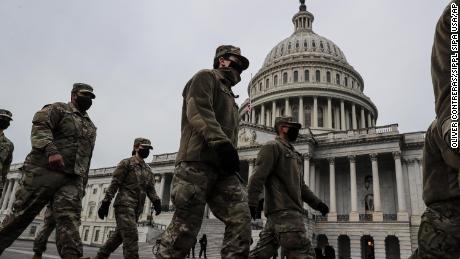 National Guard members march on the U.S. Capitol Building grounds on January 11, 2020 in Washington, DC after a pro-Trump insurrectionist mob breached the security of the nations capitol on Jan 6. 